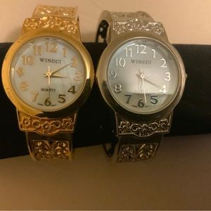 2 fashion wristwatches. Gold and silver toned. Costume  need battery’s.